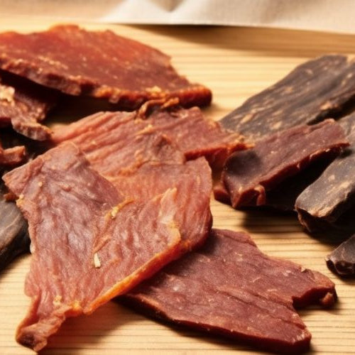 Dog jerky treats on a wooden table
